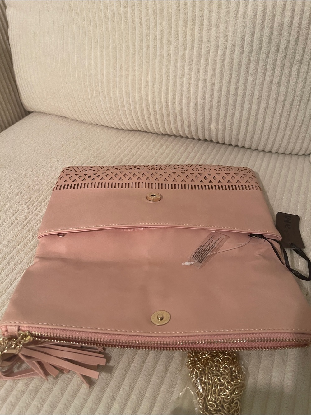 Women’s Pink Laser-Cut Tassel Foldover Clutch - Picture 8 of 8